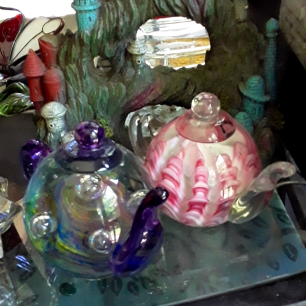 Glass teapot paperweights